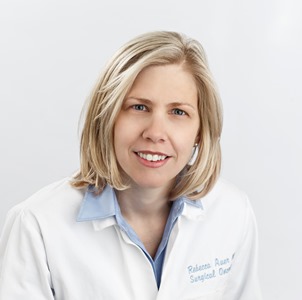 A female doctor in a lab coat